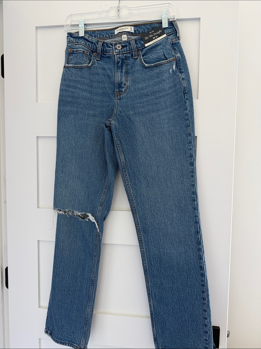 High-Rise Blue Women's Jeans with Knee Distress